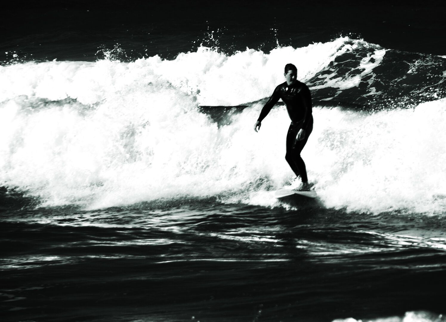 Surfing the waves

#surfer #ocean #atlanticocean #blackandwhite #monochrome #highcontrast #blackandwhitephotography  #photography